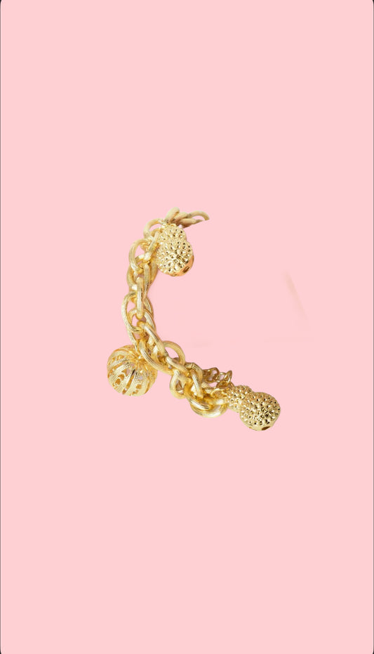 Golden globe charm bracelet